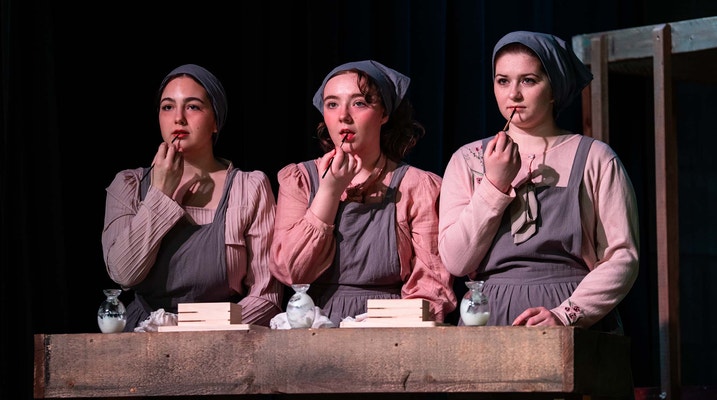 students play characters in Radium Girls during a dress rehearsal